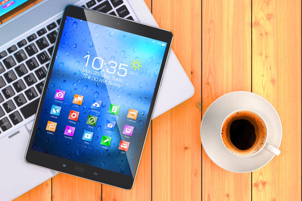 Laptop, tablet and cup of coffee