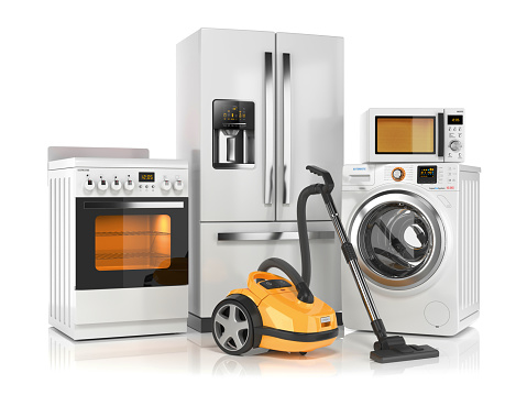 Conjunto de aparatos electrodomésticos. Refrigerador, lavadora, horno microondas, estufa y aspiradora photo