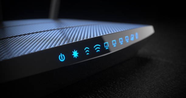 bezprzewodowy router internetowy wi-fi na ciemnym tle - modem wireless technology wlan communication zdjęcia i obrazy z banku zdjęć