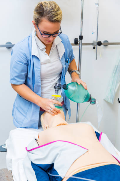 istock First aid CPR seminar,mechanical ventilation of dummy 691432918