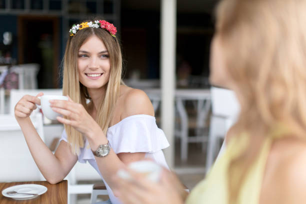istock Friends chatting over coffee in cafe 691438824