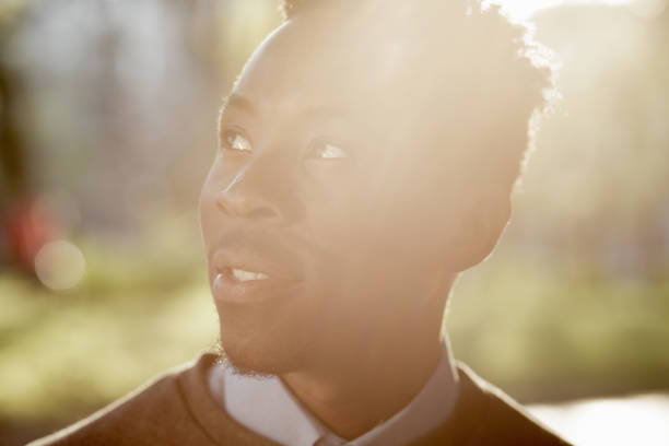 istock African american man portrait in sunny evening 691445416