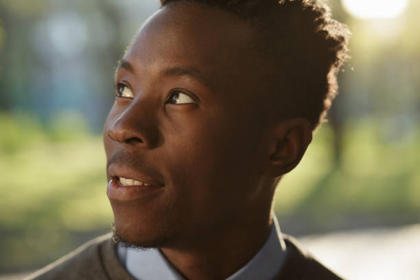 istock African american man portrait in sunny evening 691445454