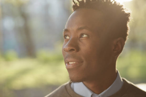istock African american man portrait in sunny evening 691445520