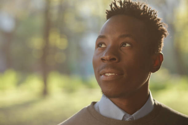 istock African american man portrait in sunny evening 691445534