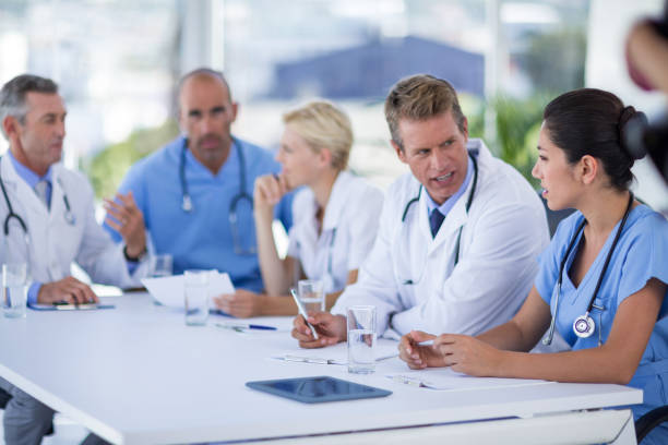 istock Teams of doctors working together 691452576
