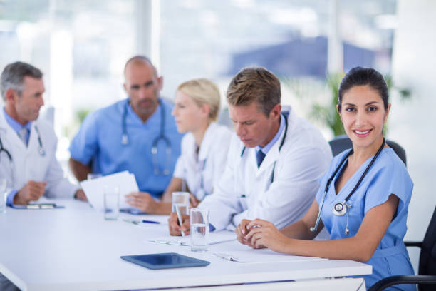 istock Teams of doctors working together 691452630