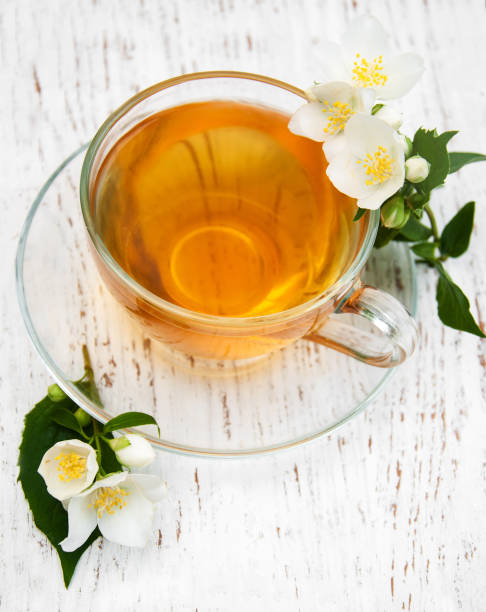 istock Cup of tea with jasmine flowers 691452700