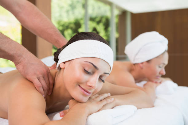 istock Pretty friends getting massages together 691455758