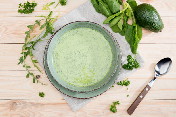 istock green creamy soup with fresh healthy ingredients on table 691456210