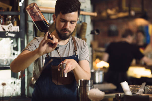 istock Young male bartender preparing an alcohol cocktail 691461622