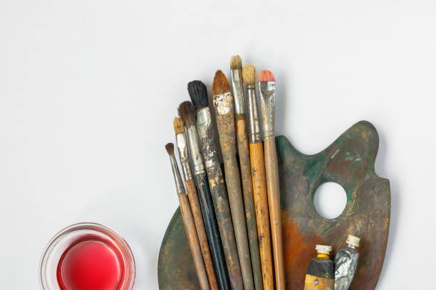 istock Brushes, palette, tubes with paint and solvent 691463916