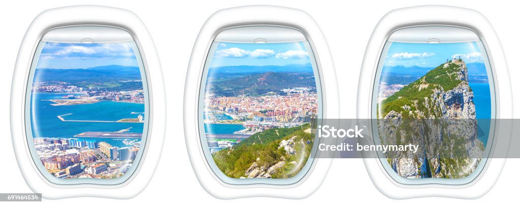 Porthole windows on Gibraltar Rock Three porthole frame windows on top of Gibraltar Rock. Gibraltar is a territory of South West Europe which is part of the United Kingdom. Above Stock Photo