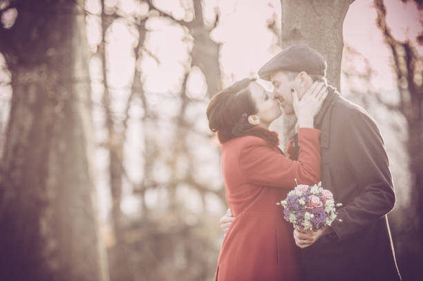 Bride and Groom are Kissing after Wedding Ceremony