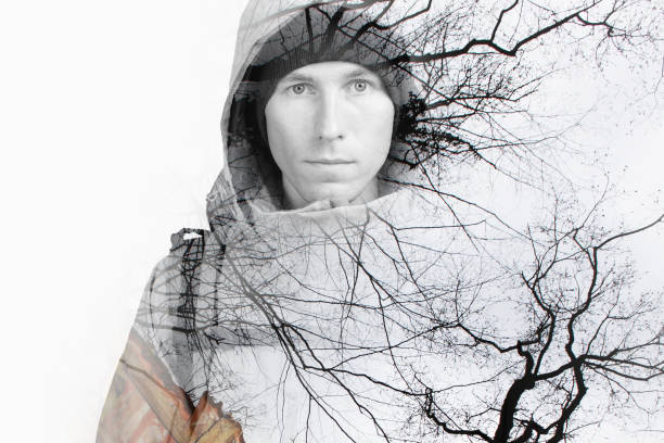 istock Double exposure effect photography. Hiker in the wild forest 691474556
