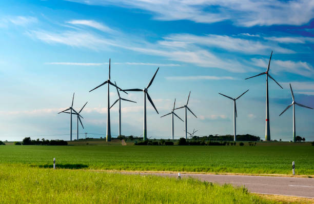 istock Production of alternative energy, solar panels and wind generators 691479540