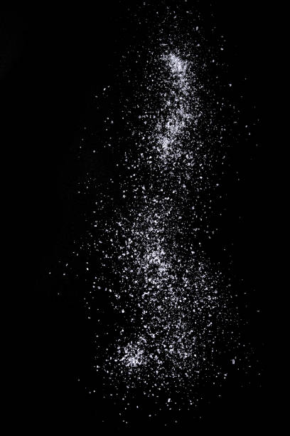 istock Sea salt over black background. 691482862