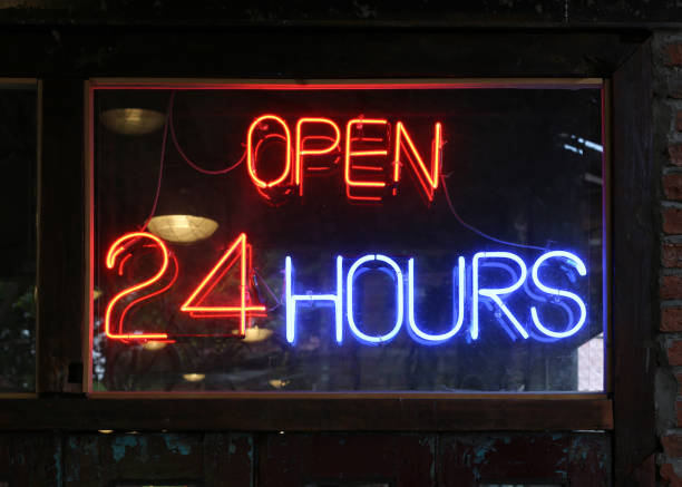 istock Open 24 Hours neon sign on a restaurant. 691490152