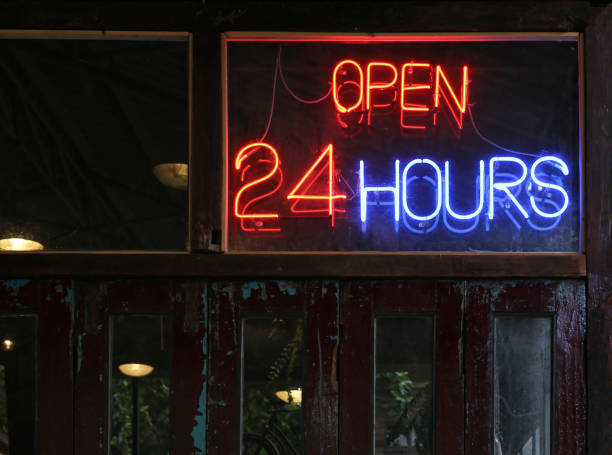 istock Open 24 Hours neon sign on a restaurant. 691490210