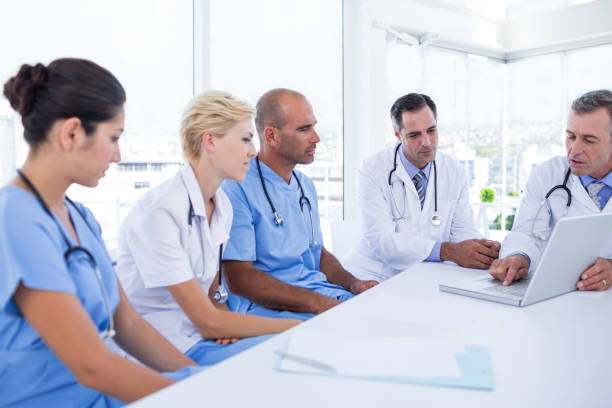 istock Team of doctor looking at computer 691493182