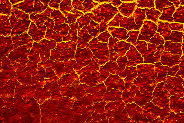 istock heat red cracked ground texture after eruption volcano 691508386
