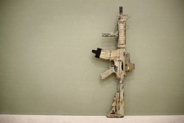 istock Assault Rifle, painted in sand color. 691521226