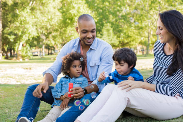 istock Happy family at park 691523894