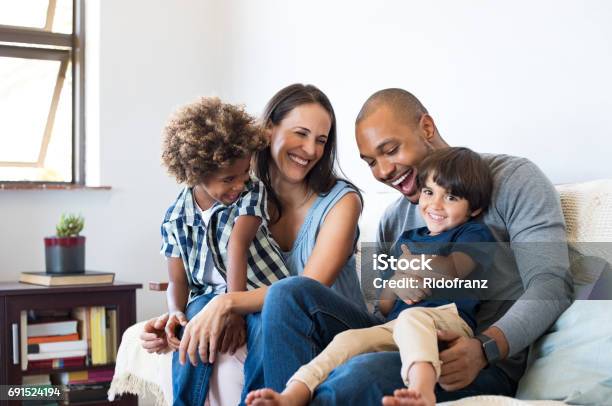 Family Having Fun At Home Stock Photo - Download Image Now - Family, Multiracial Group, Multiracial Person