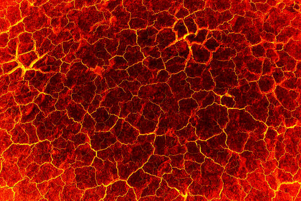 istock heat red cracked ground texture after eruption volcano 691526966