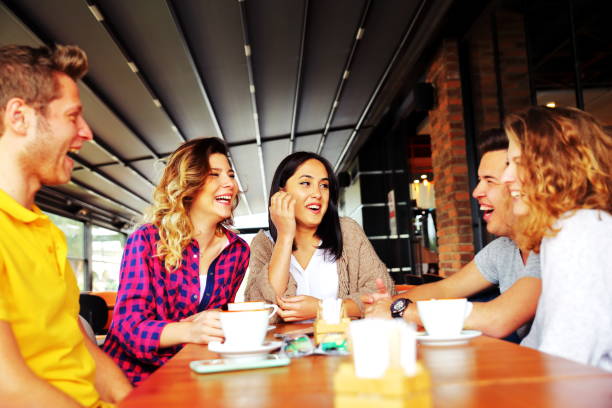 istock Group of people resting in the cafe 691527888
