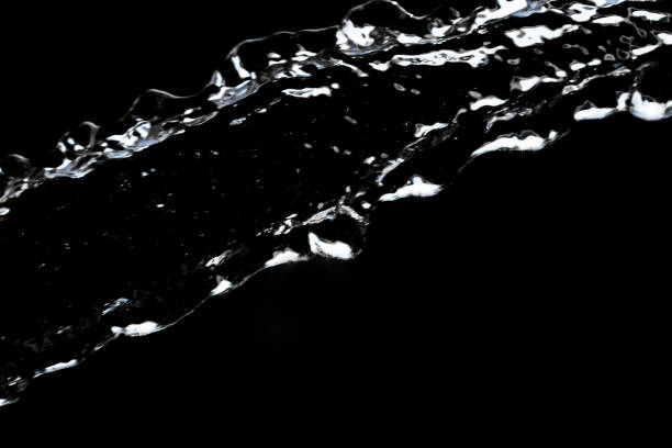 istock stream of water on a black background 691537562