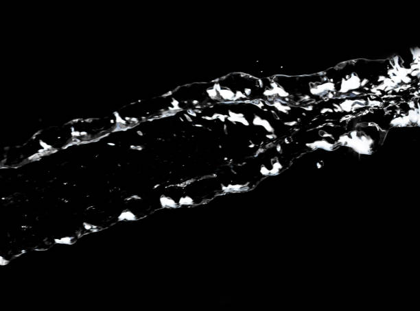 istock stream of water on a black background 691537836