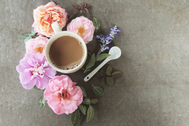 istock Cup of coffee with flowers 691548106