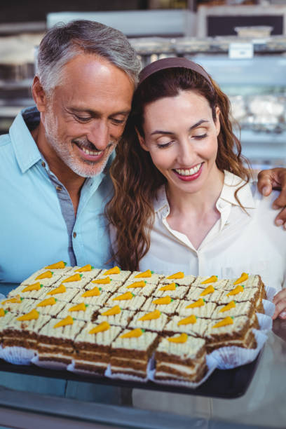 istock Cute couple looking at pastries 691548246