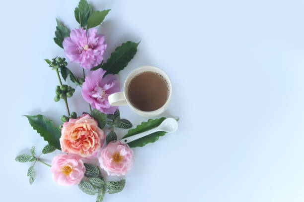 istock Cup of coffee with flowers 691548406