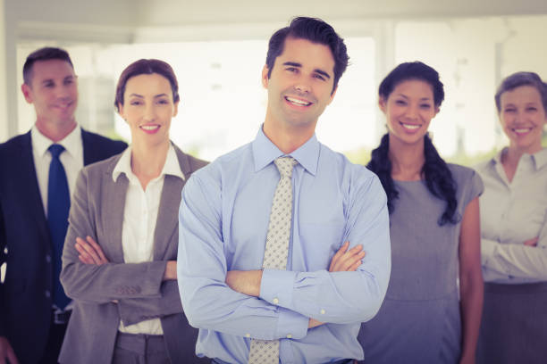 istock Business colleagues standing in a row 691551008