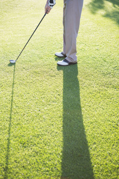 istock Golfer standing on the putting green 691551714
