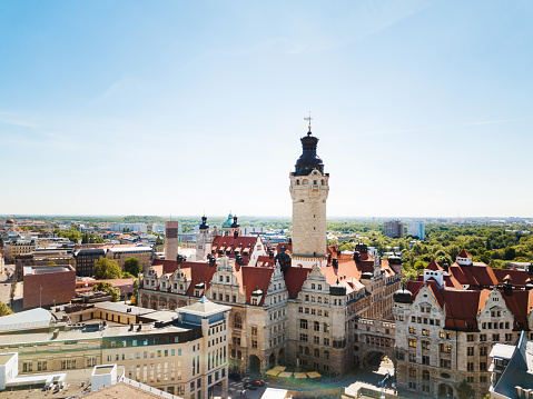 Aerial view from a drone over the new town hall in Leipzig, Germany. Shot against the sun.