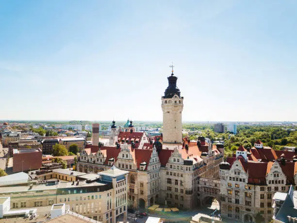 Aerial view from a drone over the new town hall in Leipzig, Germany. Shot against the sun.