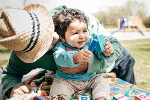 istock Father and baby in the park 691559136