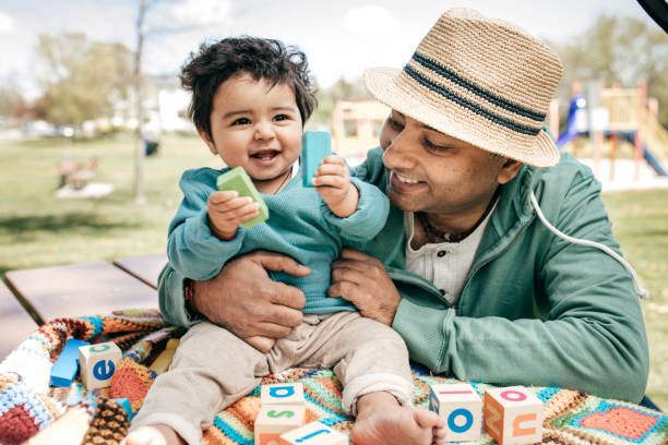 istock Father and baby in the park 691559168