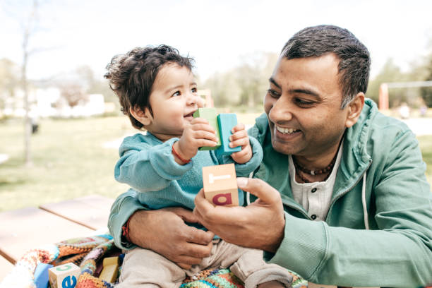 istock Father and baby in the park 691559210