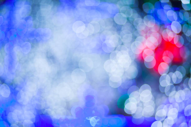 istock Abstract Yellow Purple lights Heart bokeh background 691562334