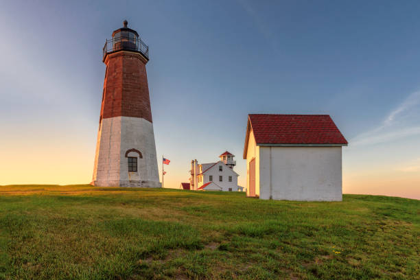istock Point Judith lighthouse in Rhode Island at sunset. 691569474