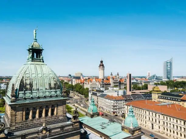 Aerial view from a drone over the new town hall in Leipzig, Germany. University tower (Uniriese in german) is seen in the background, the Federal Administrative Court (Bundesverwaltungsgericht) in the foreground.