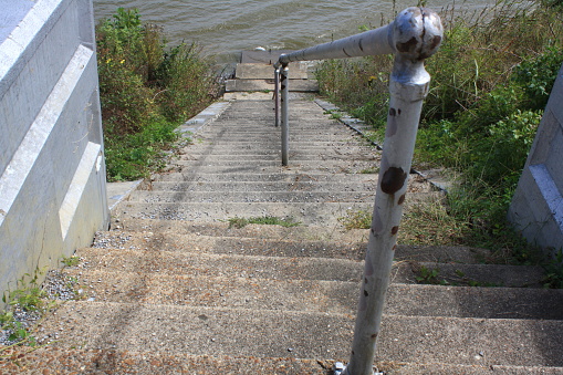 Old steps and handrail lead down to Ohio River.