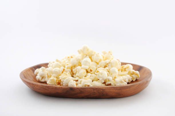 istock Popcorn on a plate isolated on white background 691595158