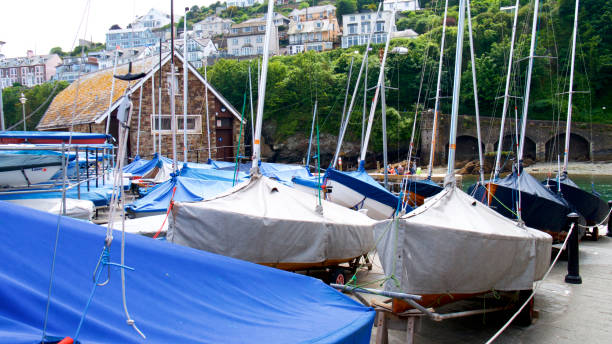 Small sailing boats A group of small sailing boats o the harbour-side sailing dinghy stock pictures, royalty-free photos & images