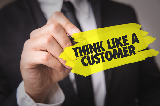 Think Like a Customer sign