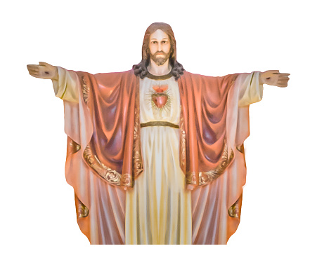 Wood sculpture of jesus christ in front view isolated on white background